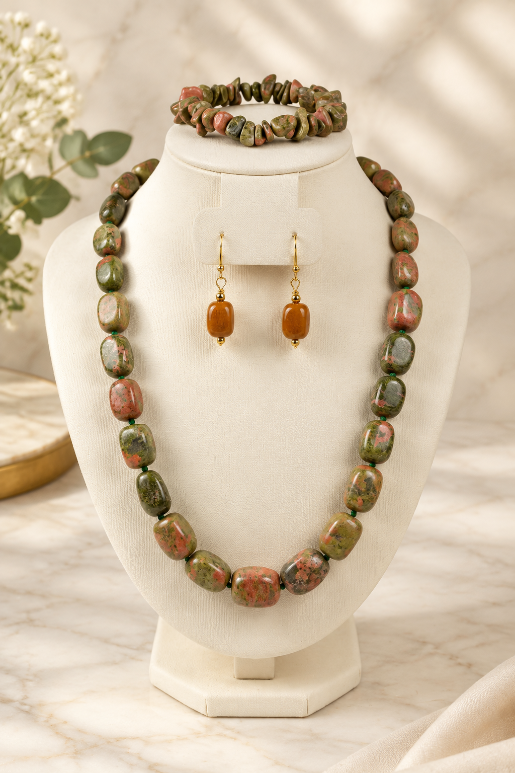 Unakite Earth Stone Complete Set on cream marble