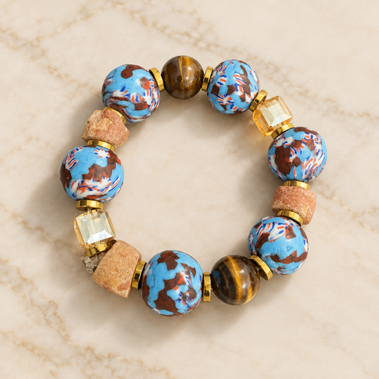 Auri Safari Bracelet on a cream-marble background