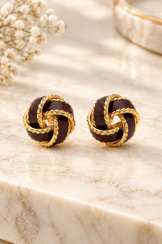 Brown Enamel and Gold Stud Earrings on cream marble