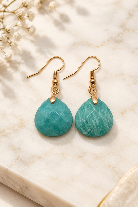 Faceted Amazonite Gemstone Drops on cream marble
