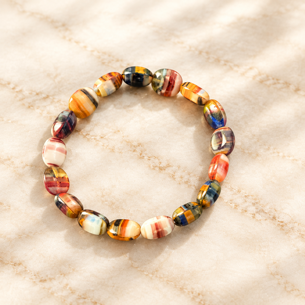First bracelet photo on cream marble