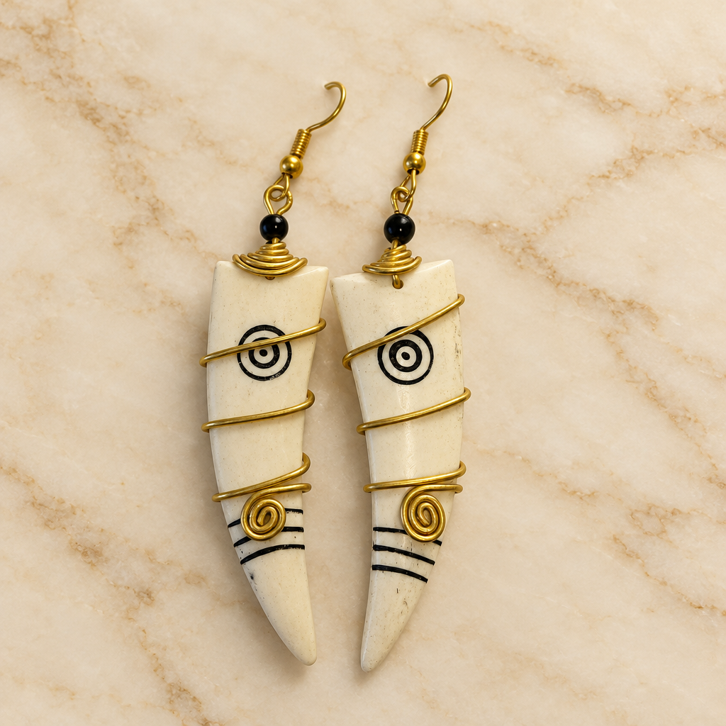 Ivory Tapered Drop Earrings with cream marble background