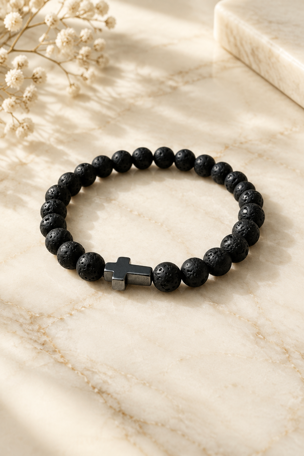 Lava Stone Sovereign Bracelet on cream marble