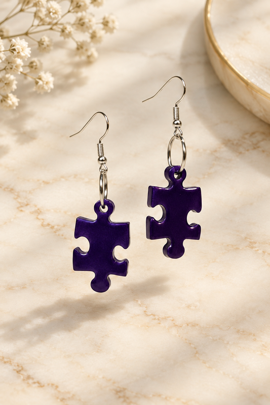 Purple Puzzle Drop Earrings on cream marble