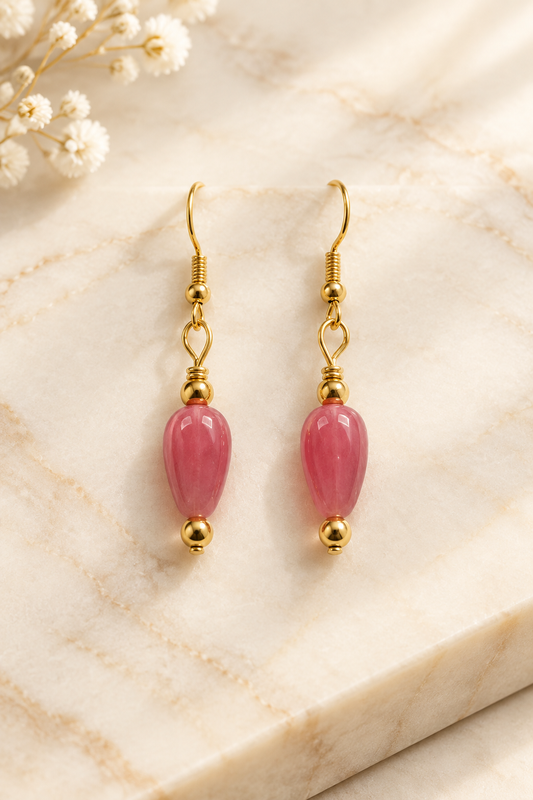Rose Stone Teardrop Earrings on cream marble